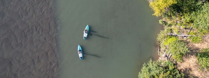 Overhead view of suping in the Hood River from the spit